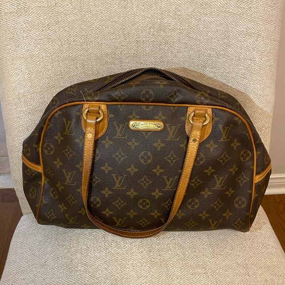 Louis Vuitton Handbags - Louis Vuitton Montorgueil with LV Lock and Key